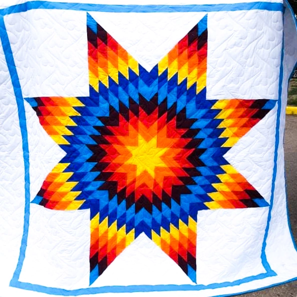 Star Quilt image 1 by Florentine Blue Thunder. (Image Courtesy of Artist.)